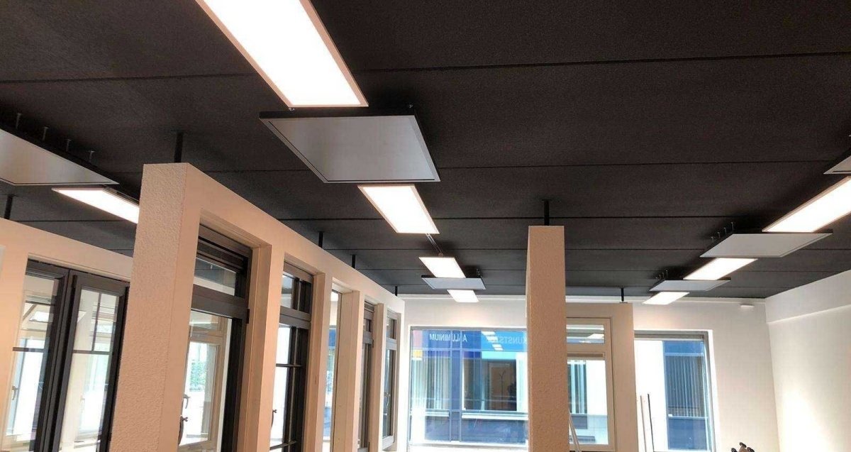 The black panels on the ceiling are actually the heating system devised by Greeniuz